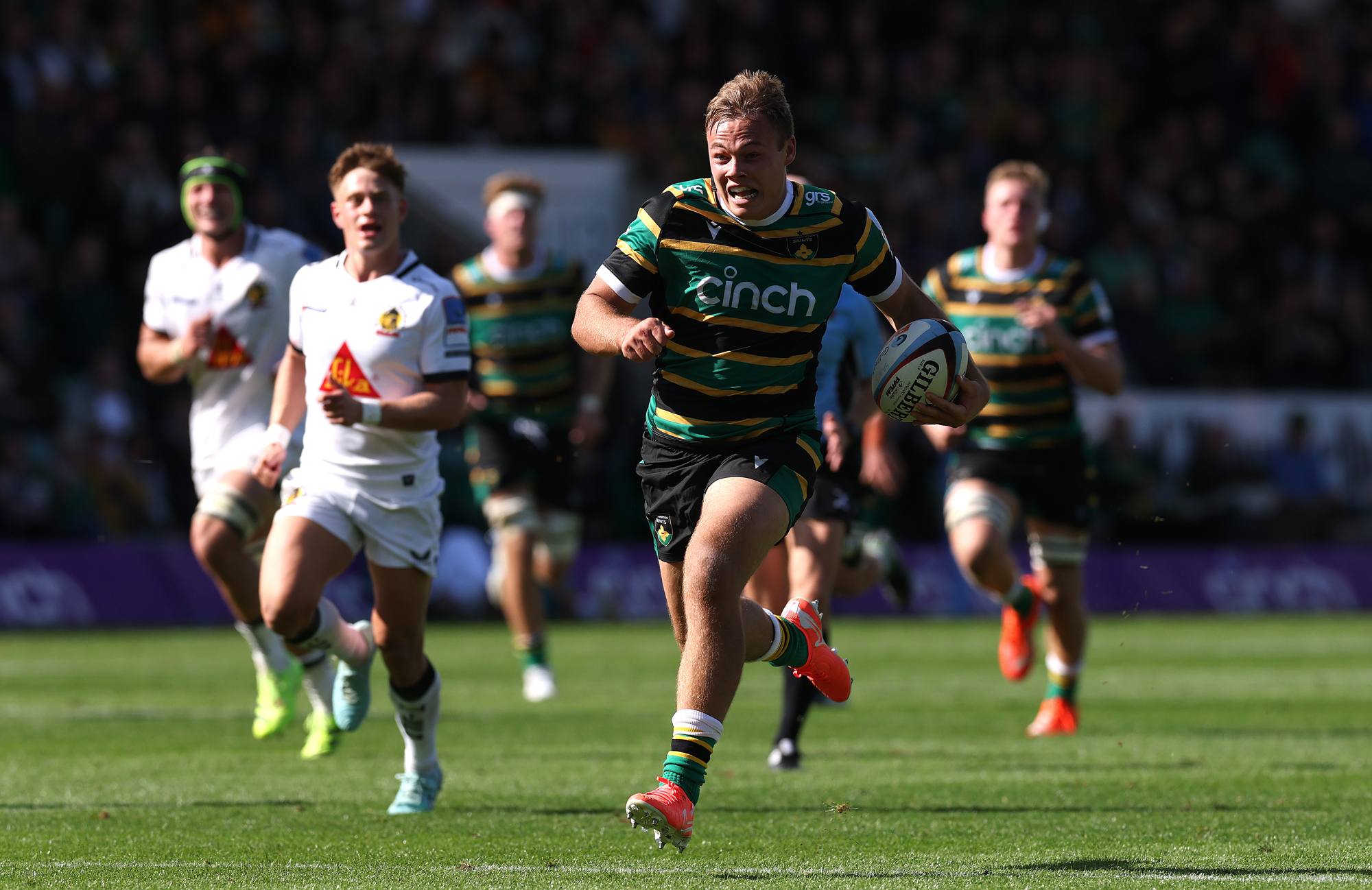 Northampton Saints' Tom Litchfield runs in his team's fourth try during the Gallagher PREM match against Exeter Chiefs in September 2025.